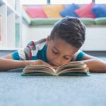 child on school floor